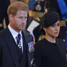 Prince Harry and Meghan Markle attend Queen Elizabeth's funeral in September 2022.