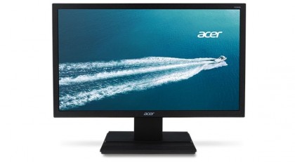 a monitor in a studio space with white background