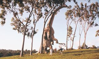 Special effects in movies: jurassic park still of dinosaur and people staring at it