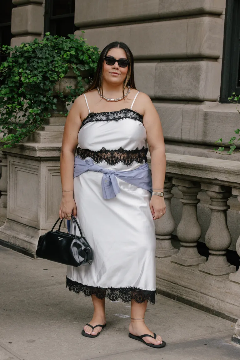 Woman in silk and lace skirt and top