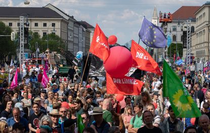 Flags of DIe Linke, Buendnis 90 / DIe Gruenen and of Europe. On 19.05.2019 some 20.000 people joined a demonstration for solidarity in Europe and against nationalism in Munich. (Photo by Alex