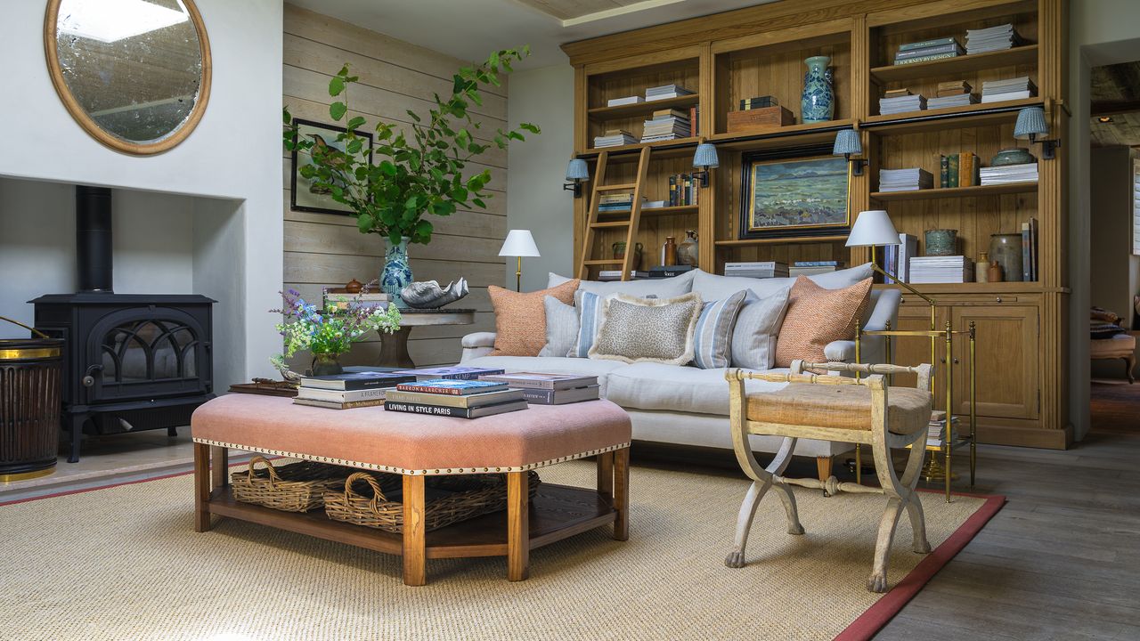 Rustic living room with large ottoman and open wooden shelving