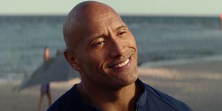 Dwayne "The Rock" Johnson's Mitch Buchannon smiling in Baywatch (2017)