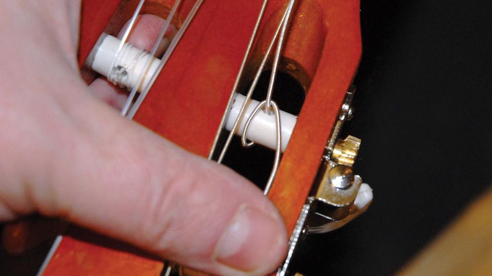 Guitar setup how to restring a nylonstring classical guitar MusicRadar