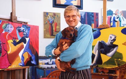 David Hockney with his pet dog.