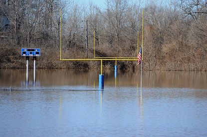 Flood-damaged football field in Missouri