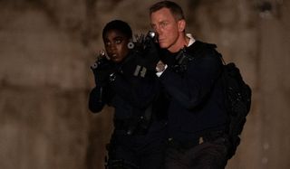 No Time To Die Lashana Lynch and Daniel Craig storming Safin's stronghold