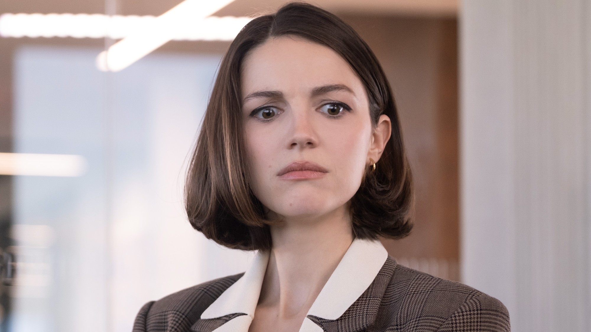 Ella Hunt looking stressed in Not Suitable For Work.