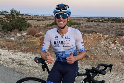 Alexandros Agrotis gives thumbs up after completing a lap of Cyprus