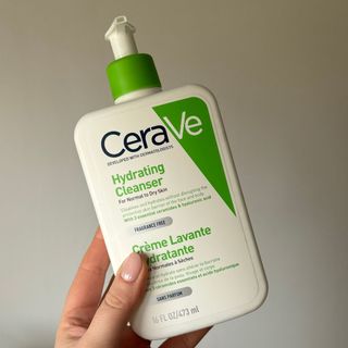 Laura holding Cerave Hydrating Cleanser - best cleanser