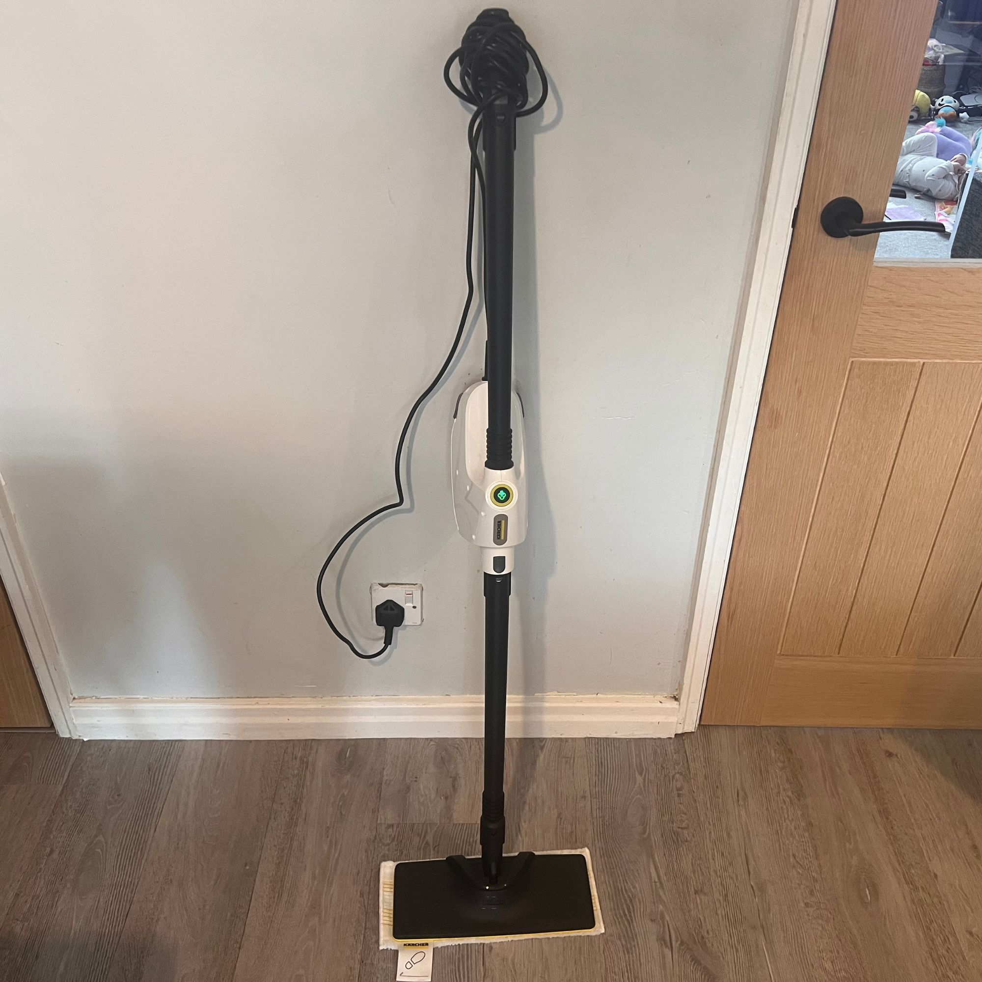 Karcher SC 1 Multi & Up Extra standing up against a wall