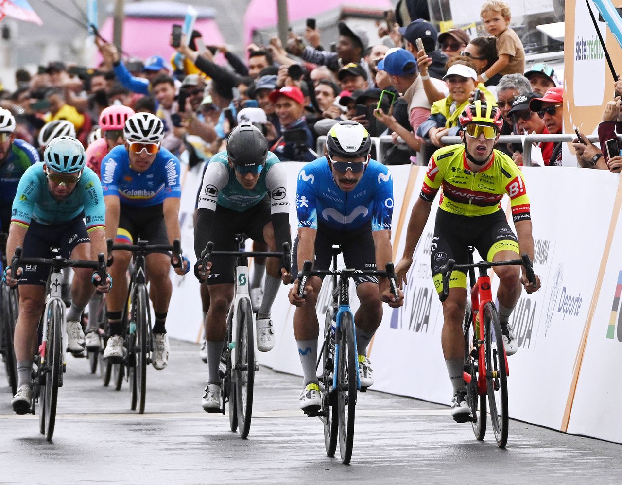 PAIPA, COLOMBIA - FEBRUARY 06: (L-R) Mark Cavendish of The United Kingdom and Astana Qazaqstan Team, Nelson Andr&Atilde;&copy;s Soto of Colombia and Team Petrolike, stage winner Fernando Gaviria of Colombia and Movistar Team and Davide Persico of Italy and Team Bingoal WB sprint at finish line during the 4th Tour Colombia 2024, Stage 1 a 168.6km stage from Paipa to Santa Rosa de Viterbo 2751m on February 06, 2024 in Paipa, Colombia. (Photo by Maximiliano Blanco/Getty Images)