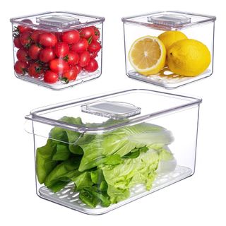 A set of three clear fridge storage caddies