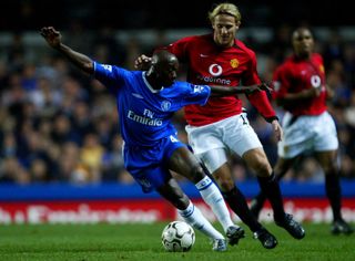 Chelsea's Claude Makelele looks to get away from Manchester United's Diego Forlan in a Premier League game in November 2003.