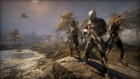 An official screenshot of Warframe showing a squad of three players.