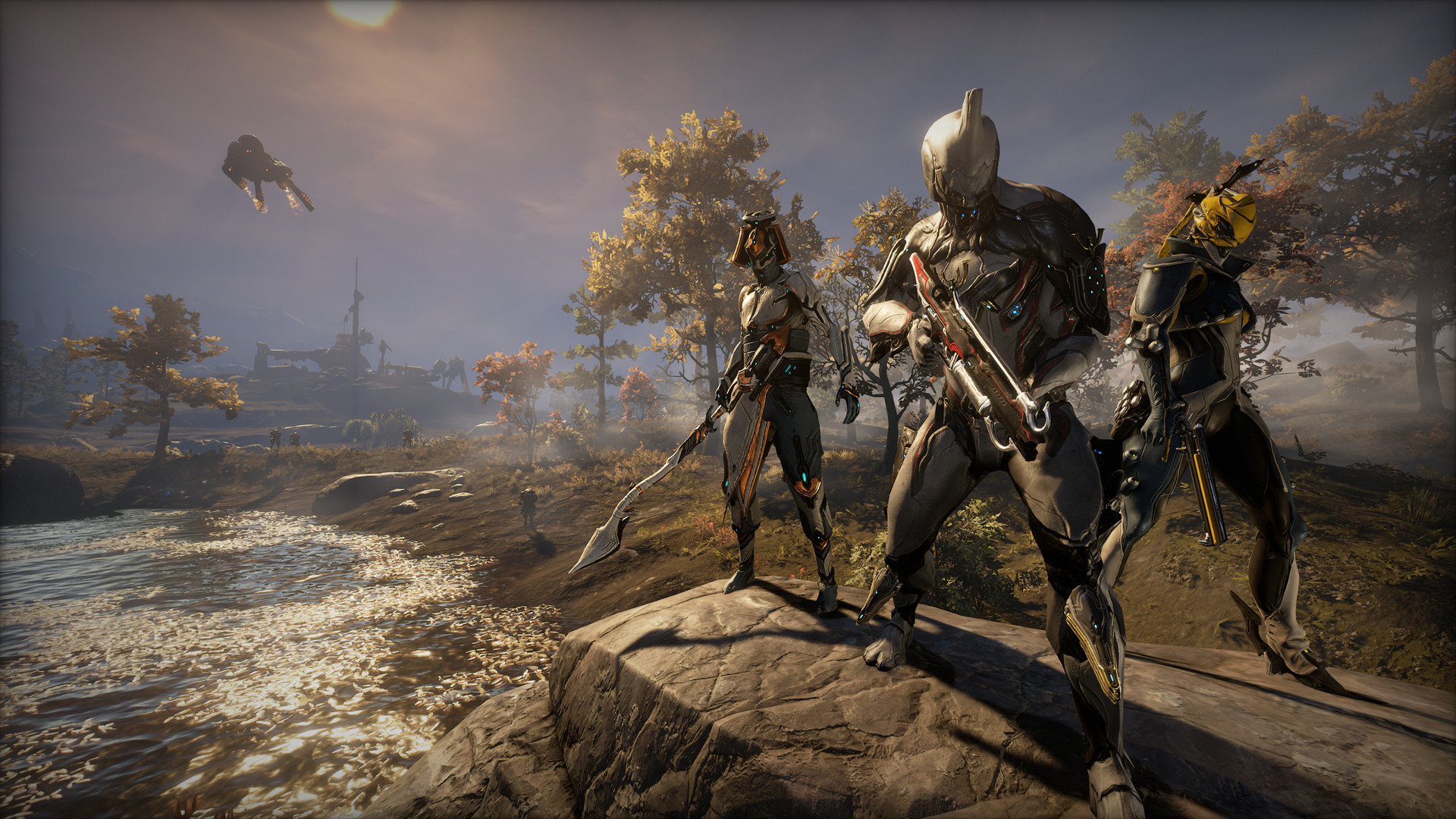 An official screenshot of Warframe showing a squad of three players.