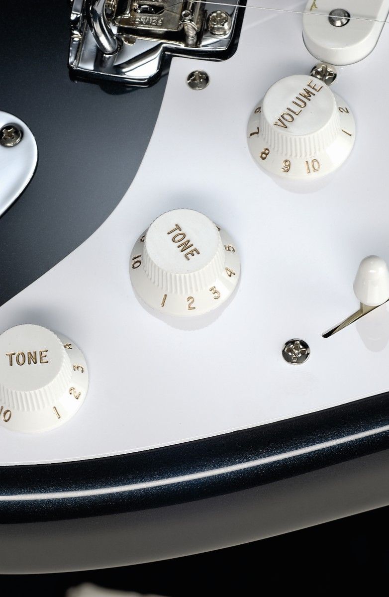 Mid boost and TBX tone controls.