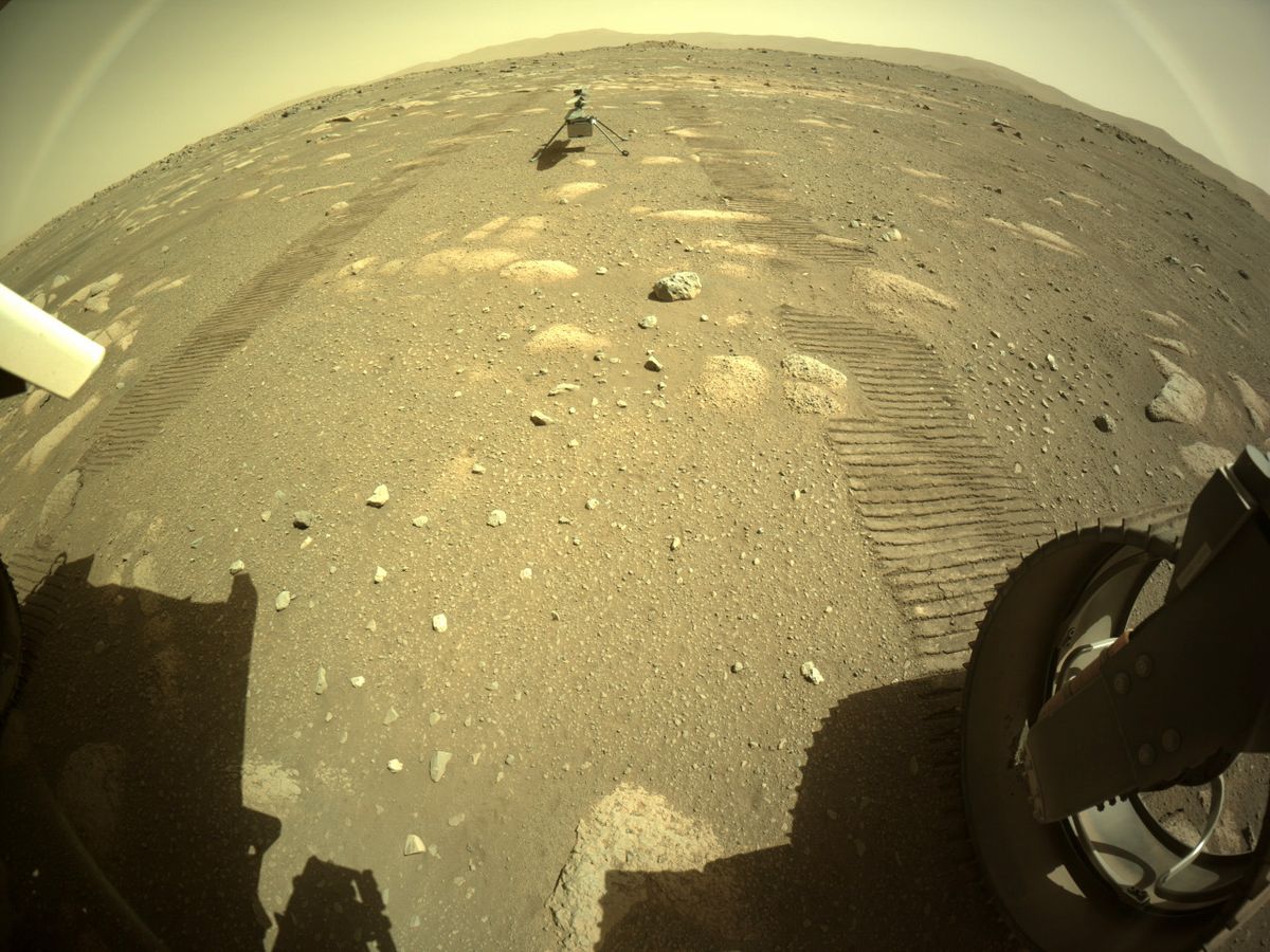 NASA's Mars Helicopter Ingenuity is seen on the surface of the Red Planet after being deployed by the Perseverance rover on April 4, 2021.