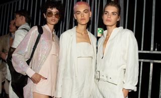Models ear light pink jacket and playsuit, and white jackets and top