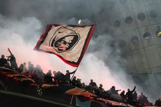 AC Milan fans at the San Siro for the Champions League first leg semi-final game against Inter