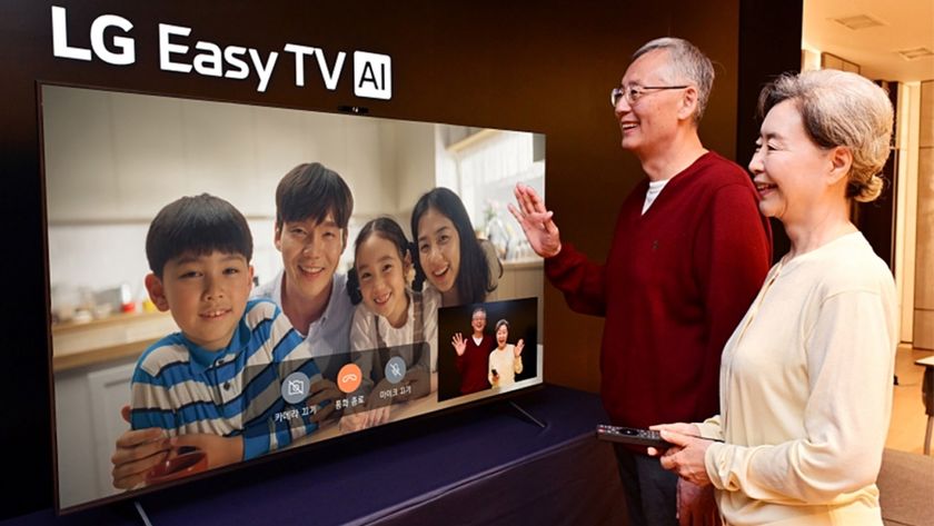 Two seniors making a video call to four children on an LG Easy TV