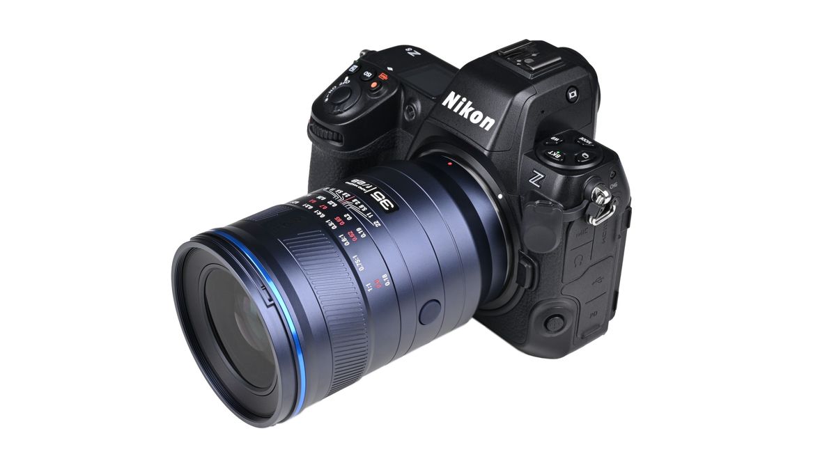 Laowa Acris 35mm f/2.8 1x Macro Apo lens mounted to a camera against a white background
