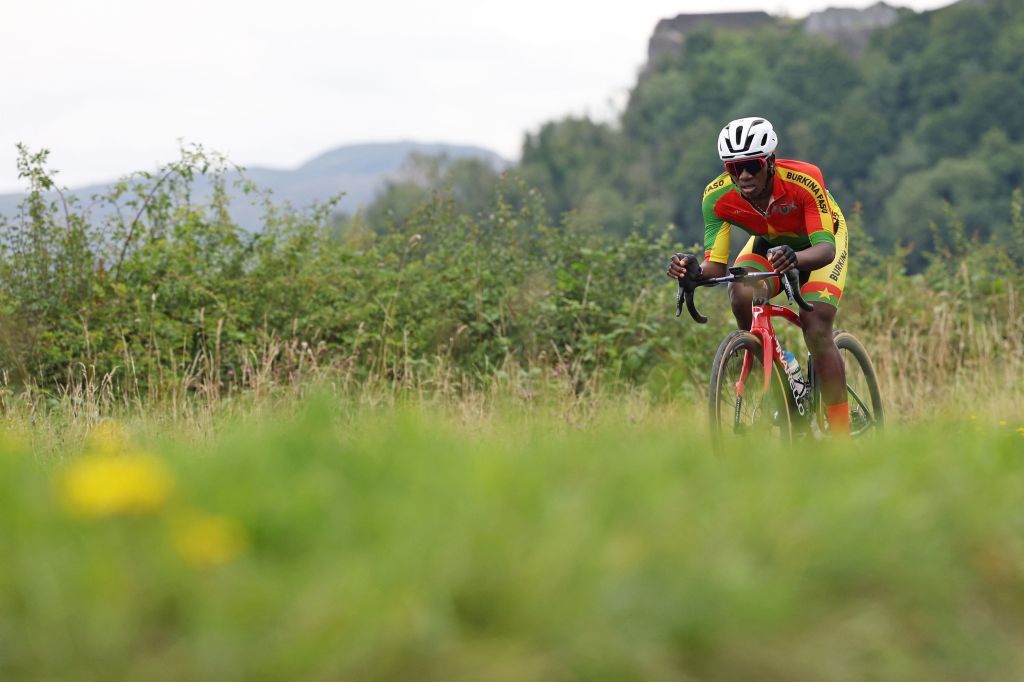 Burkina Fasos Awa Bamogo takes part in the womens Individual Time Trial in Stirling during the UCI Cycling World Championships in Scotland on August 10 2023 Photo by Adrian DENNIS AFP Photo by ADRIAN DENNISAFP via Getty Images