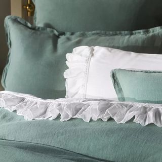 teal and white bedding