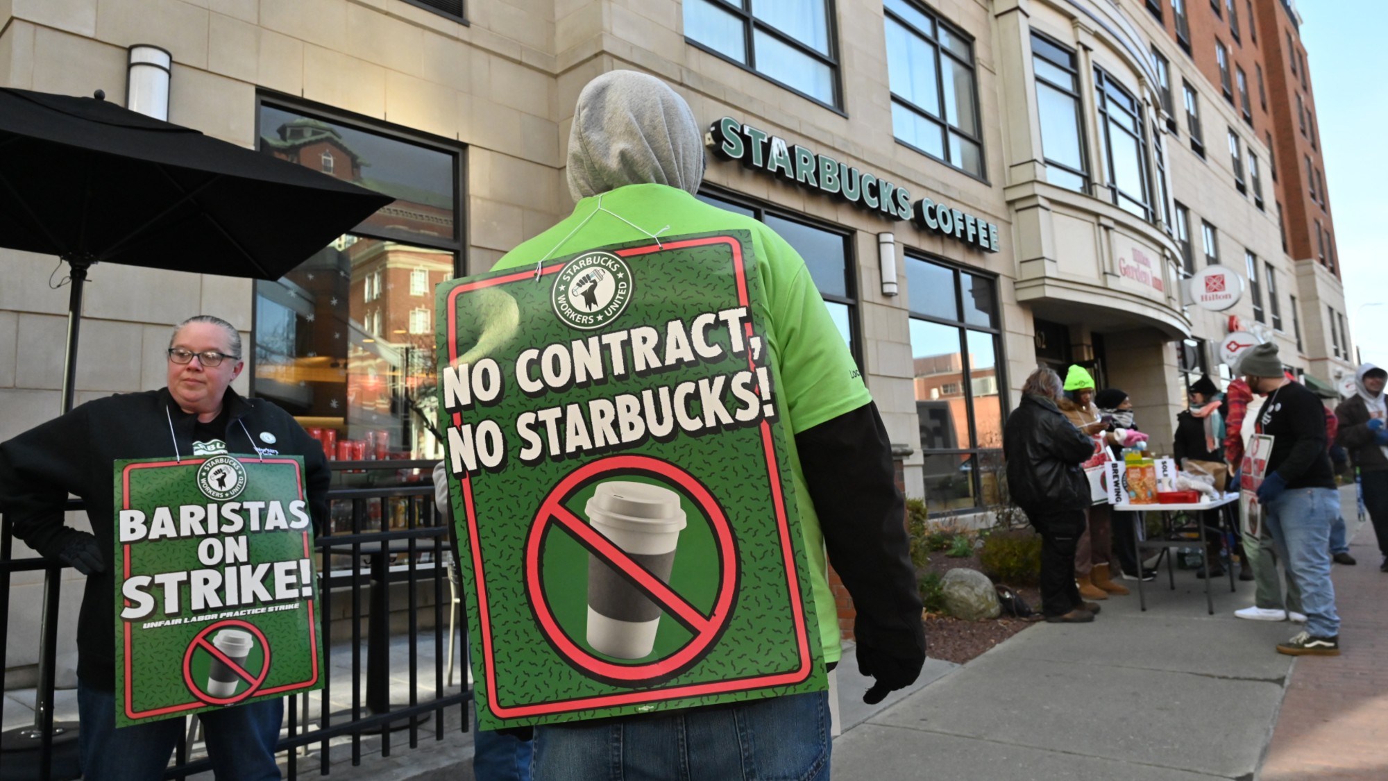 Workers strike outside a Starbucks in Albany, New York, in 2025.
