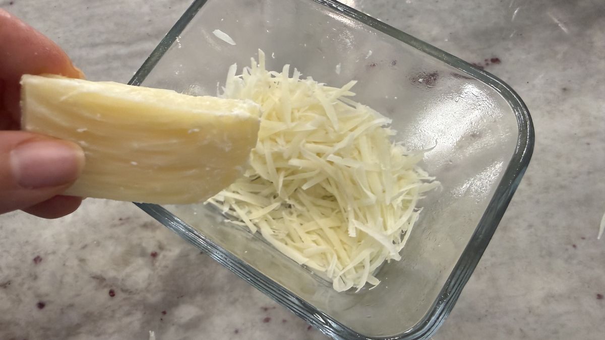 Ninja CrushBOSS shredding parmesan cheese