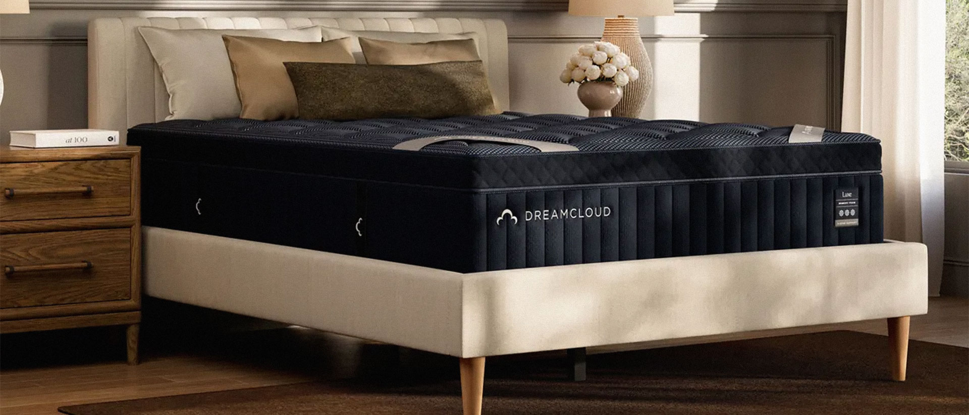 The DreamCloud Luxe Memory Foam mattress in a bedroom
