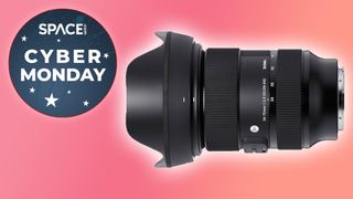 Sigma 24-70mm f/2.8 DG DN Art lens on a coloured background cheaper for cyber monday