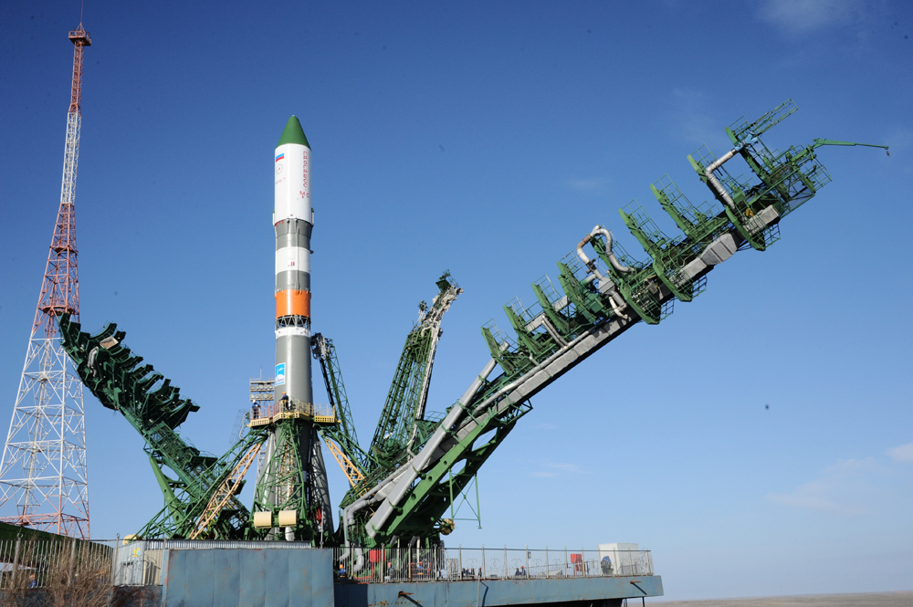 A Russian Soyuz rocket and its unmanned Progress 63P supply ship stand atop their launchpad at Baikonur Cosmodrome, Kazakhstan ahead of a March 31, 2016 launch to the International Space Station. The Progress vehicle is carrying 3 tons of supplies for the