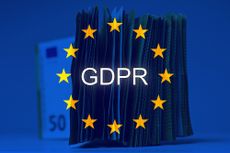 GDPR logo with a stack of Euro notes