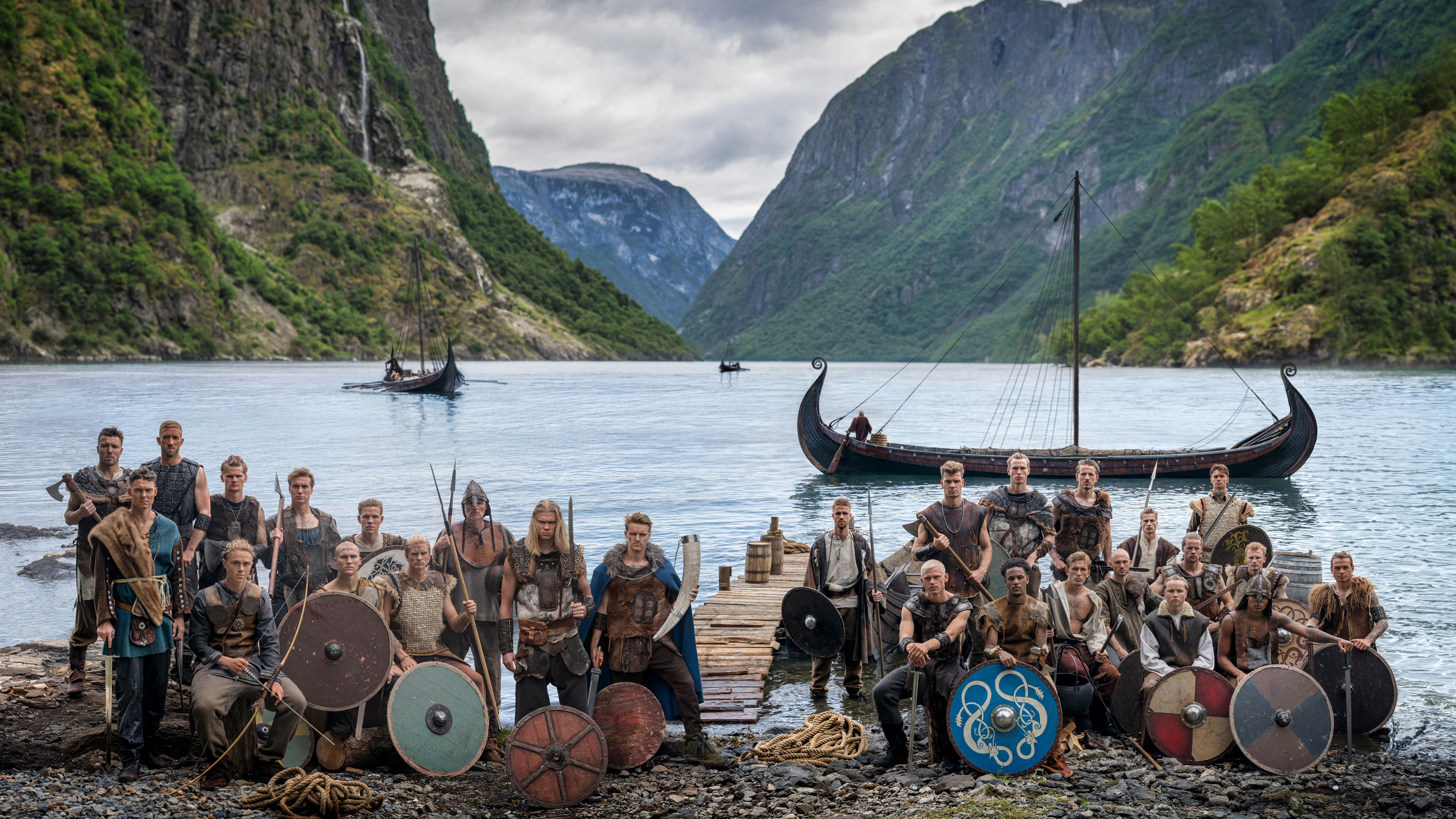 The Norway FIFA team poses as vikings on rocky beach
