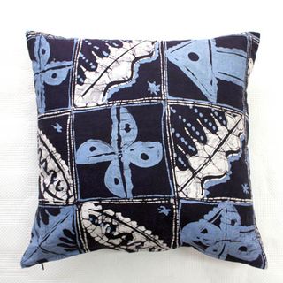 blue and white pillow with white background
