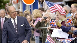 Prince Philip Looking Startled By Children In The Crowd Who Were Waving Their Flags, American And Union Jacks, During A Walkabout In Kettering, Northamptonshire