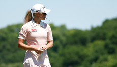 Charley Hull smokes a cigarette