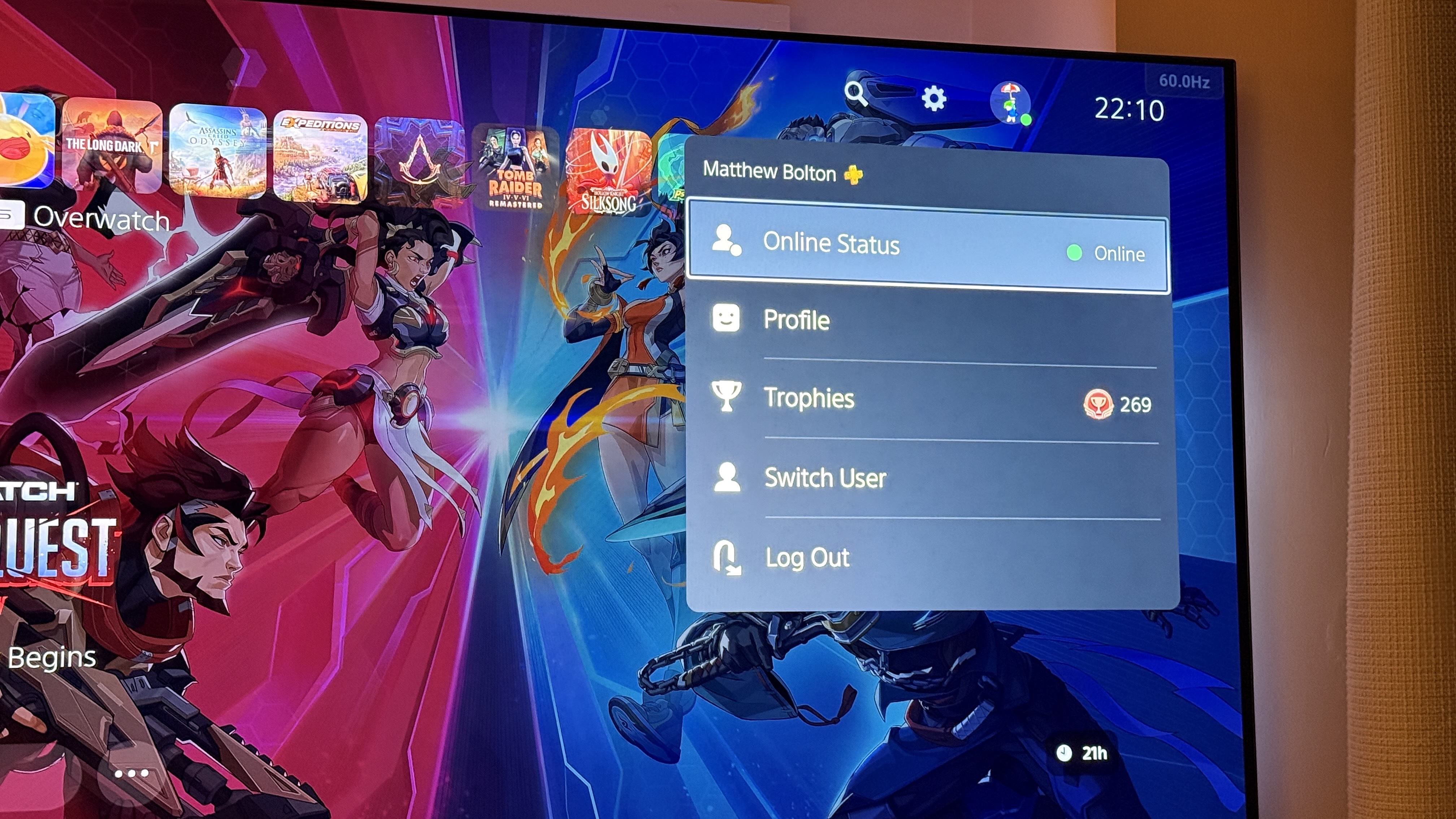 A photo of the PlayStation 5 home page, showing a status of being Online