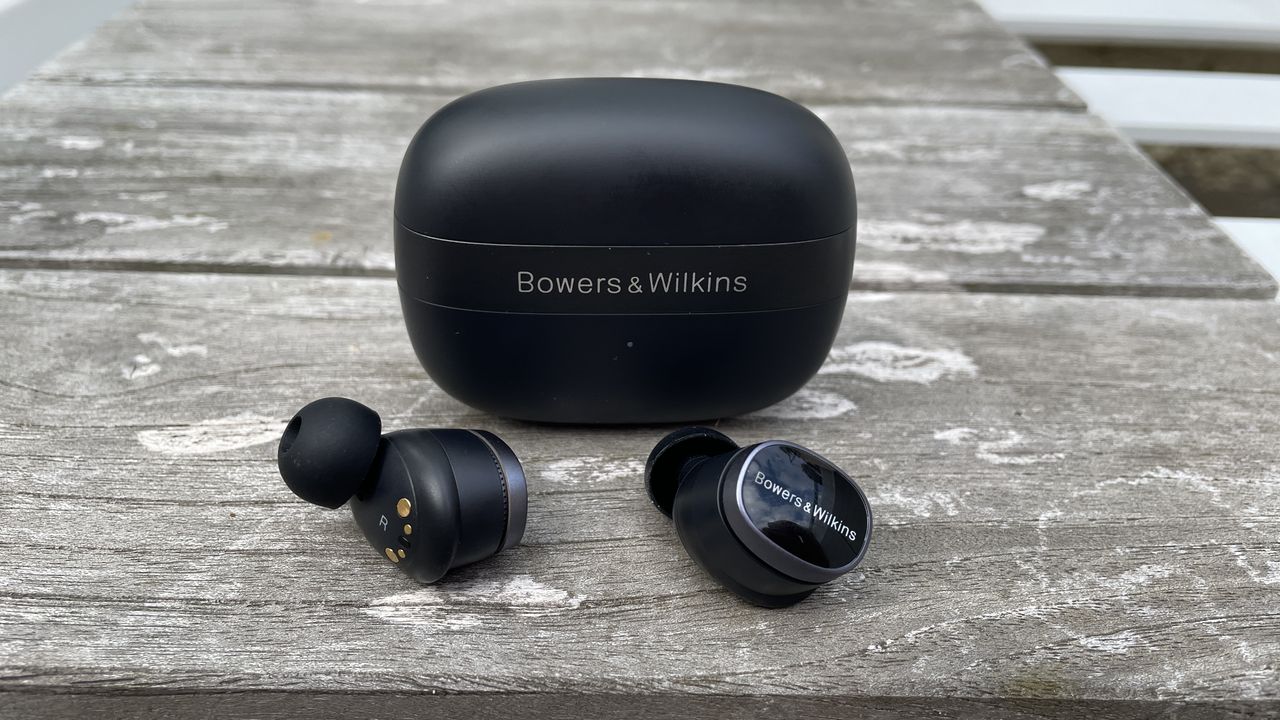 Bowers &amp; Wilkins Pi8 against grey wood background