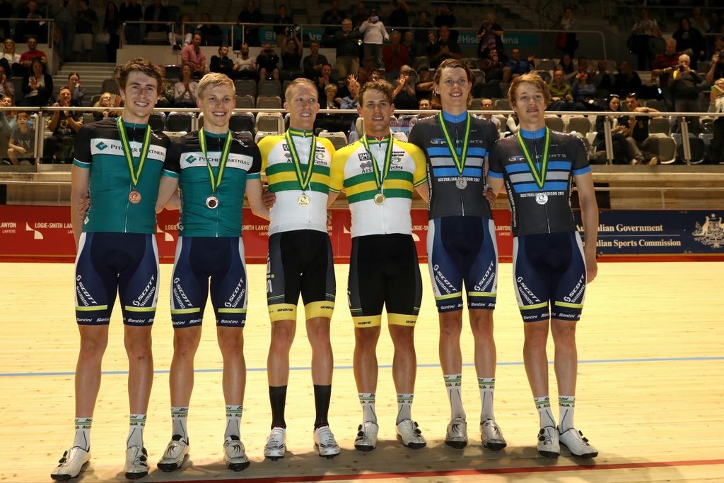 Cam Meyer and Sam Welsford in the green and gold jerseys as the national madison champions