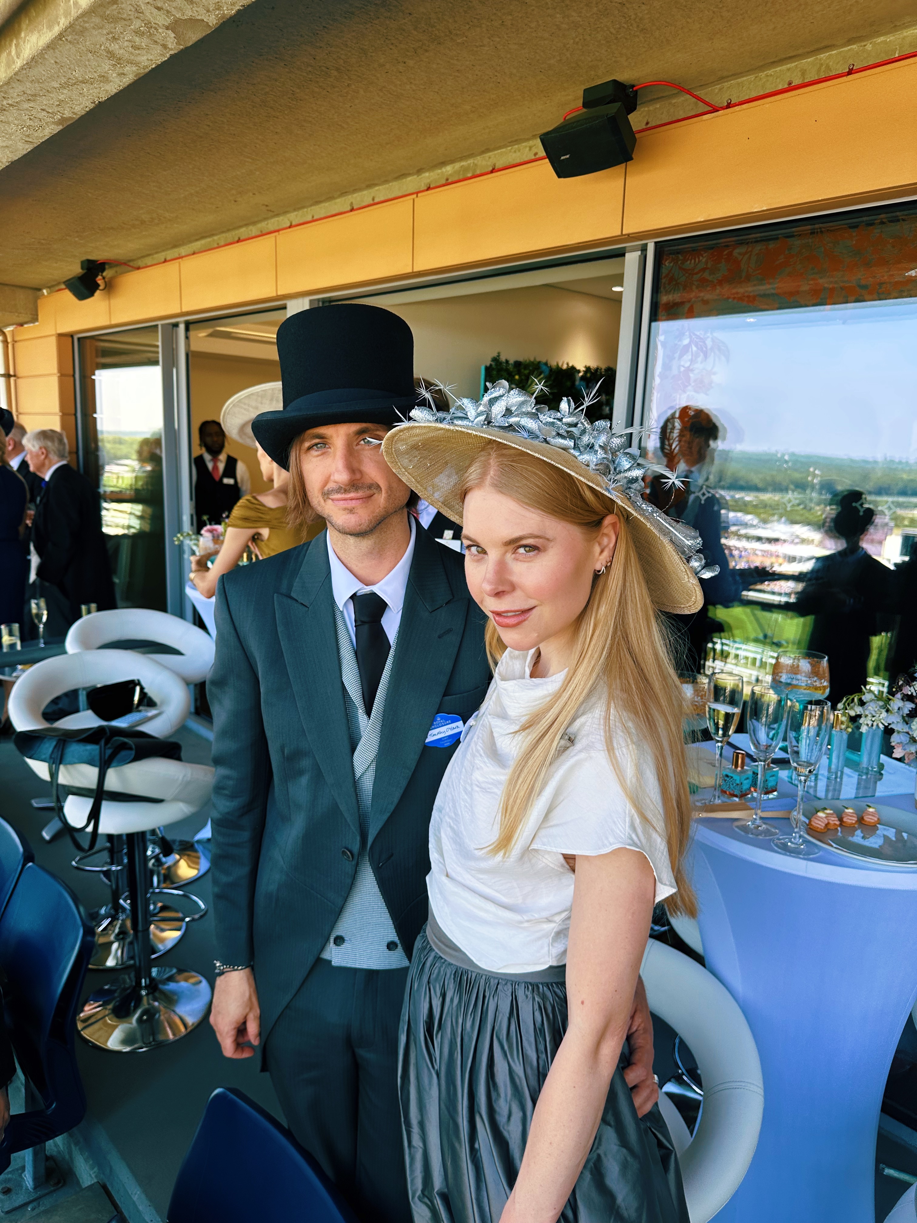 People attending Royal Ascot wearing morning dress