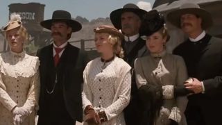 The cast of Tombstone looking at their reflection