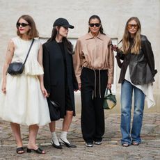 street style shot of four women at fashion week