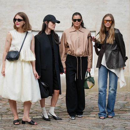 street style shot of four women at fashion week