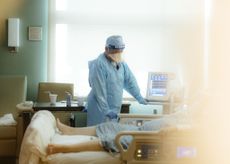 A nurse checks on a patient in the ICU Covid-19 ward at NEA Baptist Memorial Hospital in Jonesboro, Arkansas, on Aug. 4, 2021. 