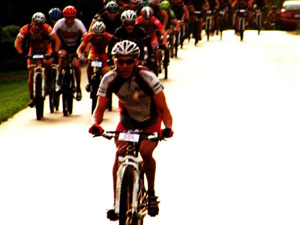 A rider charges off the front in the Mohican 100
