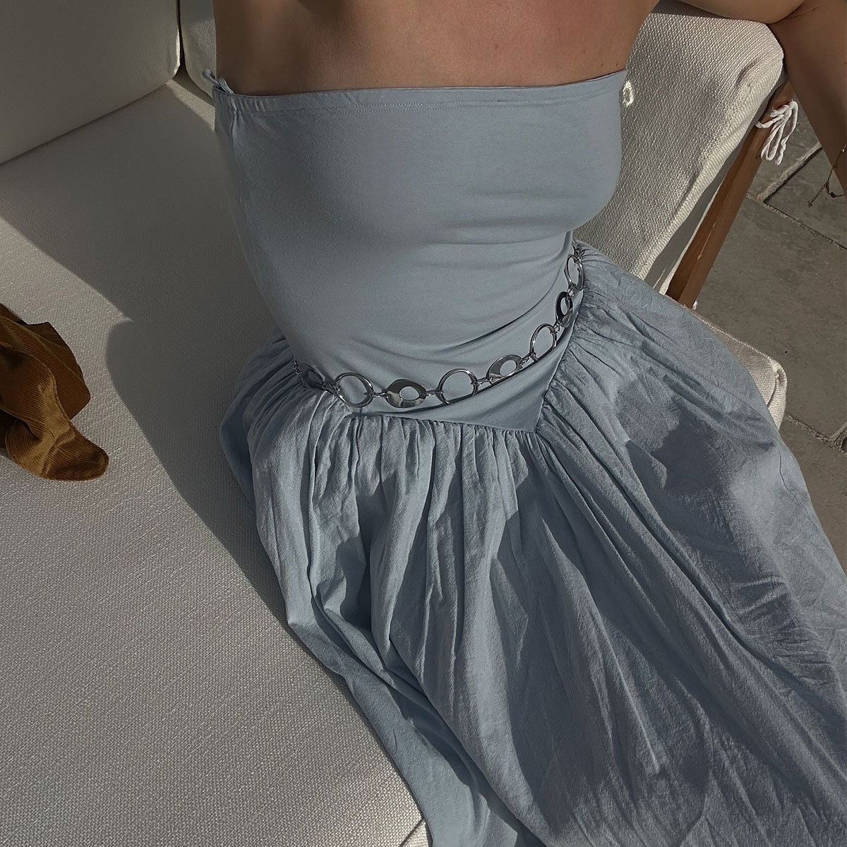 @chloekathbutler blue free people strapless dress with silver chain belt