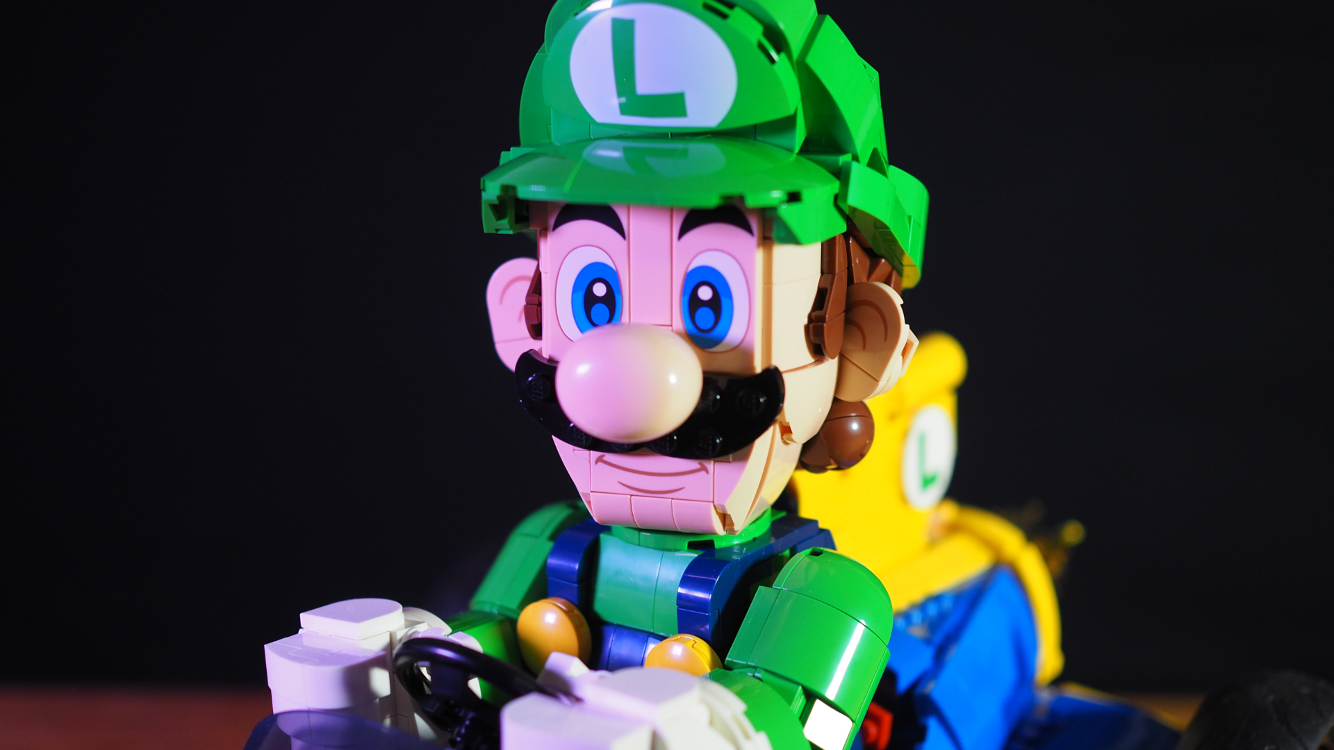 Lego Luigi against a plain black background