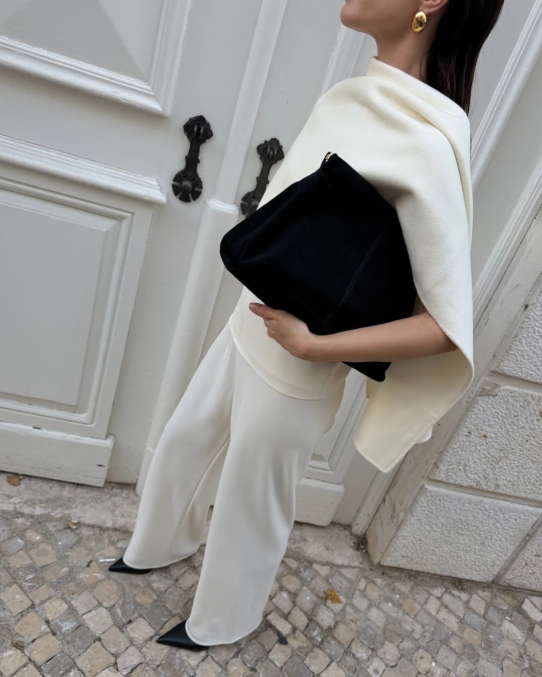 Johanna Piispa wearing an Almada Label cape